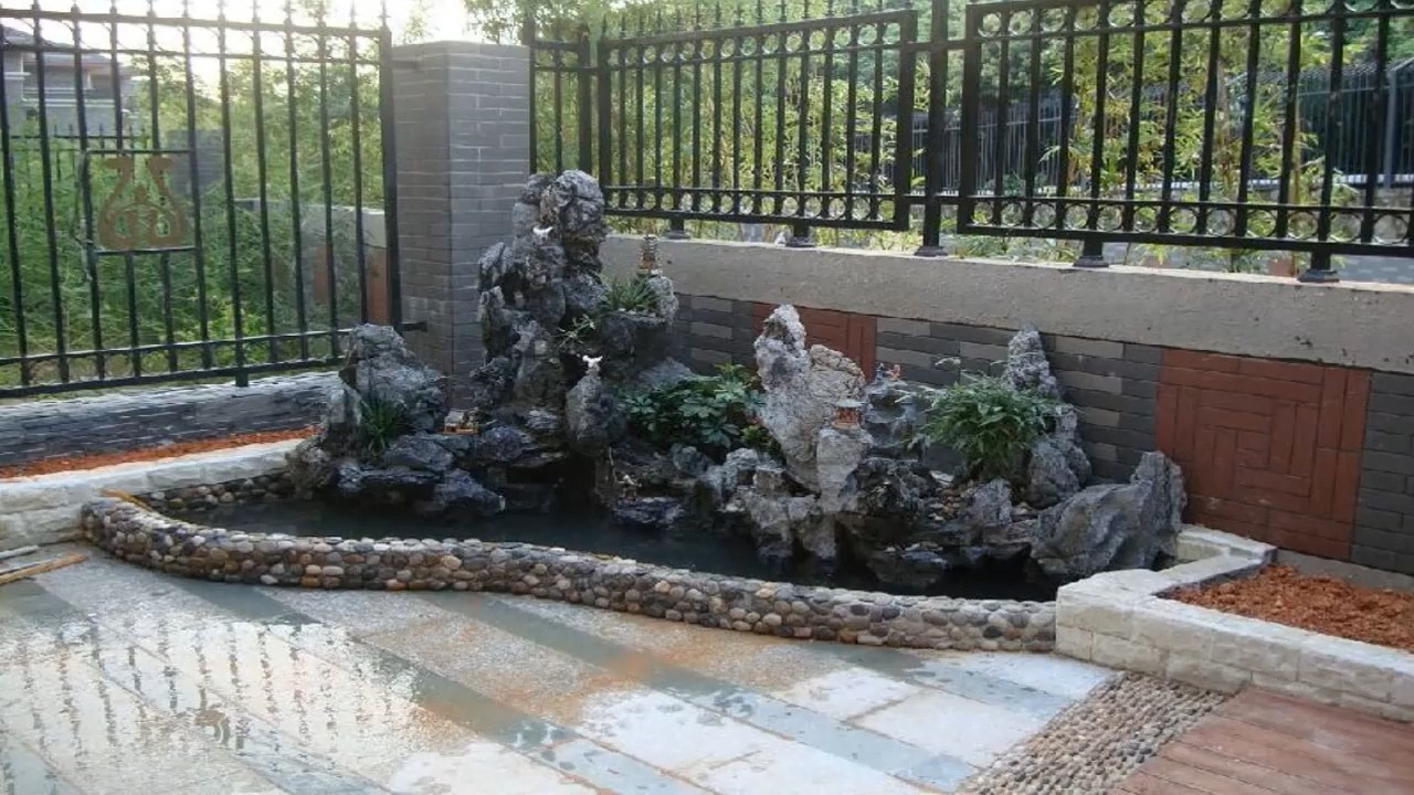 青岛大型千层石假山厂家 青色景观石 天然真石制作